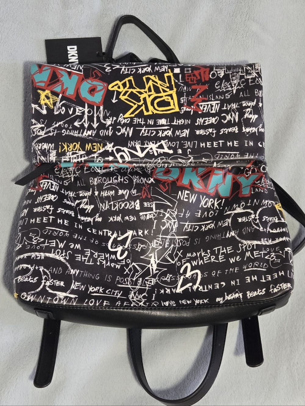 NEW - DKNY Tilly Backpack Graffiti Print Black Multicolor Zipper Buckle Accent